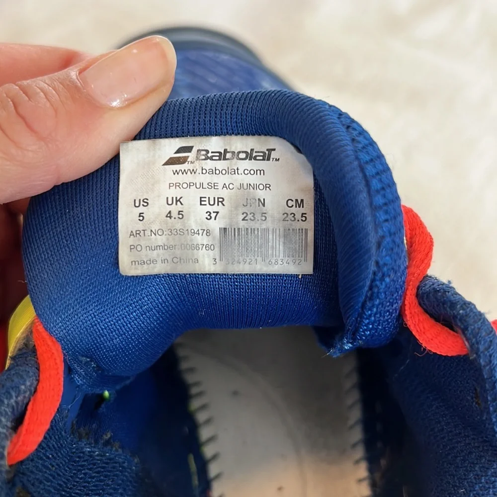 Babolat boy tennis shoes.  Size 5